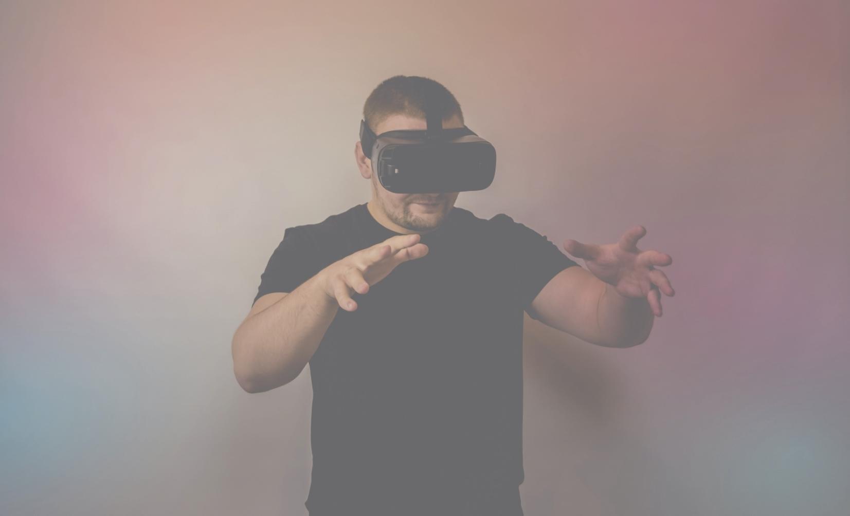 Students working on VR development projects in modern classroom